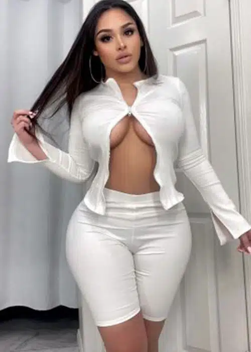 Big booty babe wears a white outfit to show off her curves.