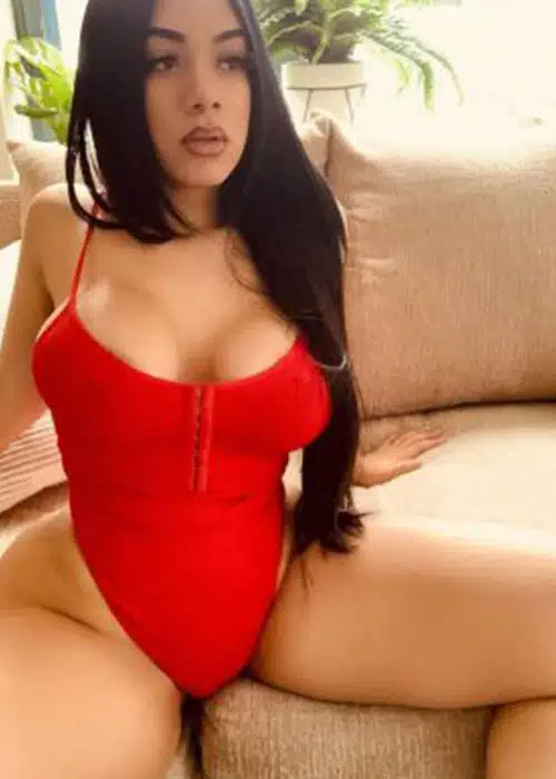 This red bathing suit does very little to hide that sexy body.